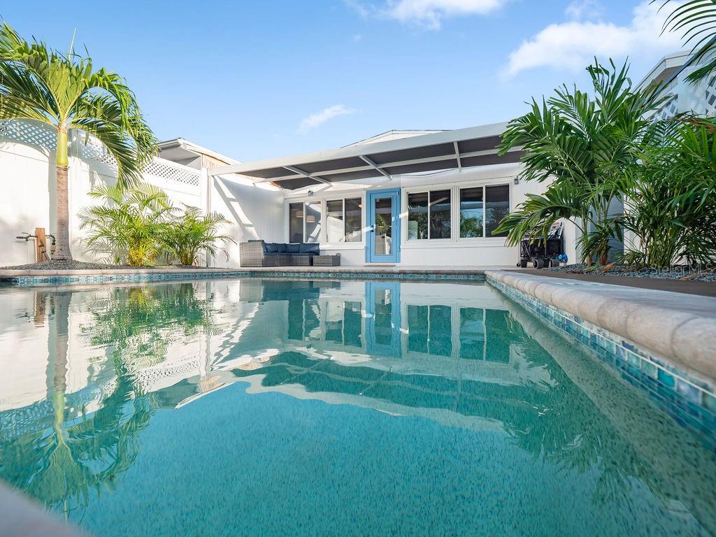 449 63rd Street Holmes Beach, FL 34217 - Photo 37 of 54 a house view with a lake view