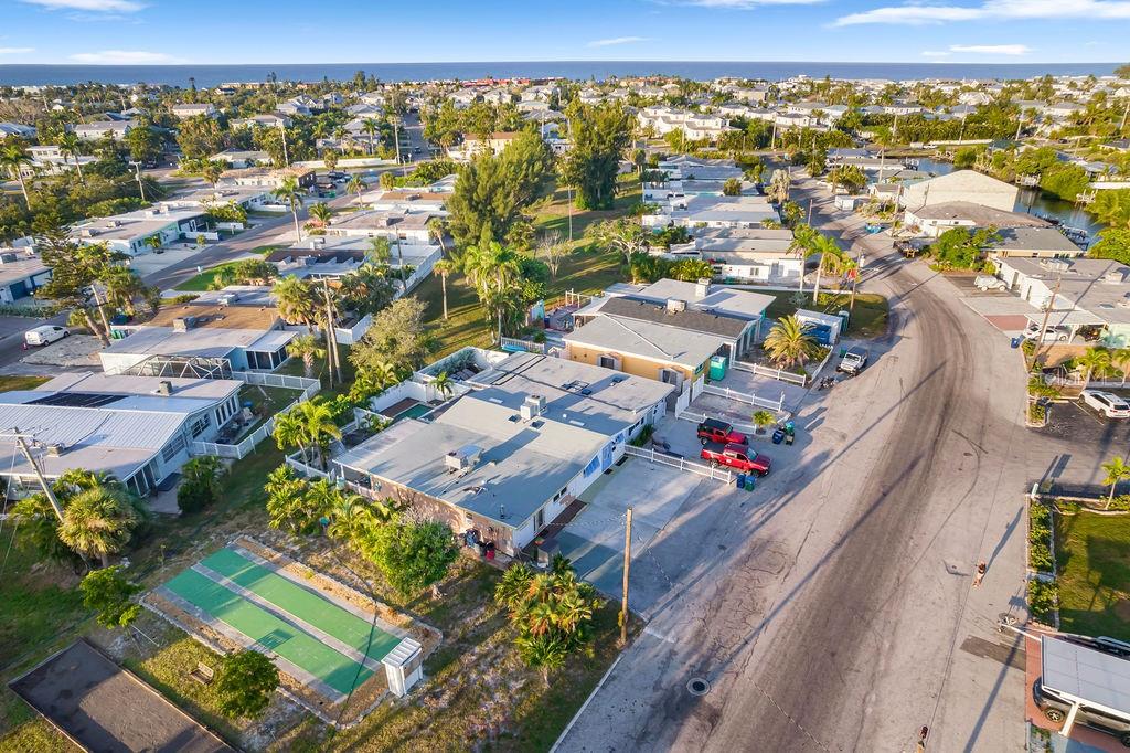 449 63rd Street Holmes Beach, FL 34217 - Photo 43 of 54 an aerial view of a city