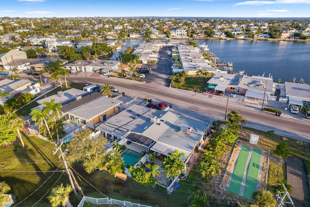 449 63rd Street Holmes Beach, FL 34217 - Photo 44 of 54 an aerial view of a house with a lake view