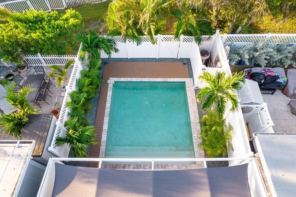 449 63rd Street Holmes Beach, FL 34217 - Photo 51 of 54 a view of a yard with an outdoor seating
