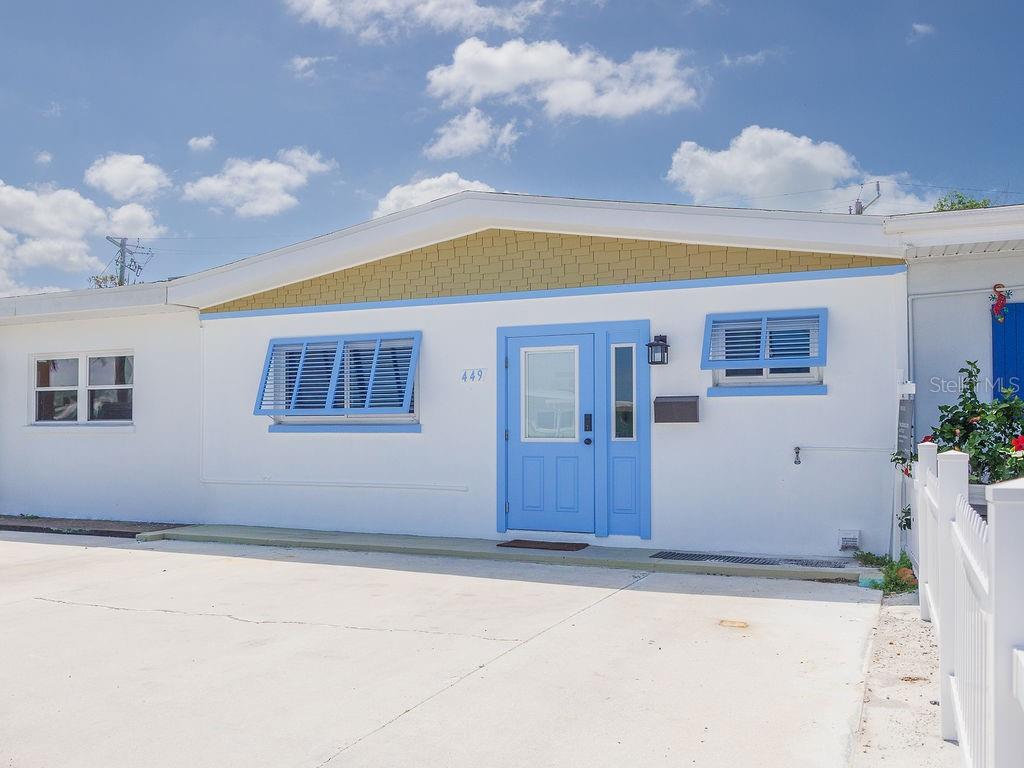 449 63rd Street Holmes Beach, FL 34217 - Photo 53 of 54 a view of house with entryway and a window