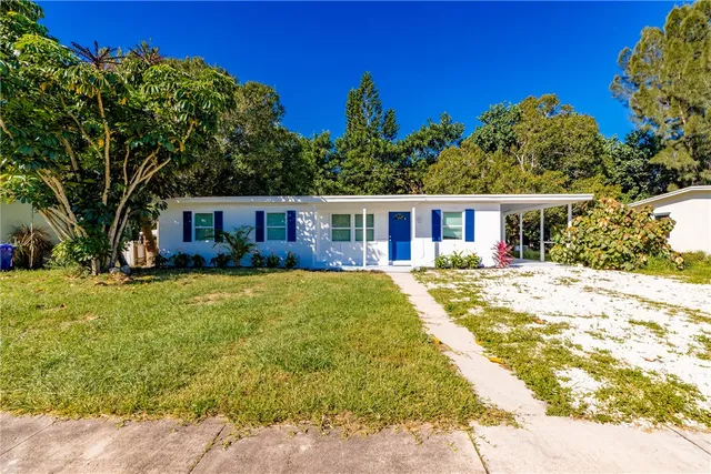 a house view with a garden space