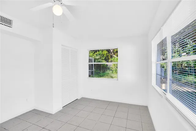 an empty room with windows