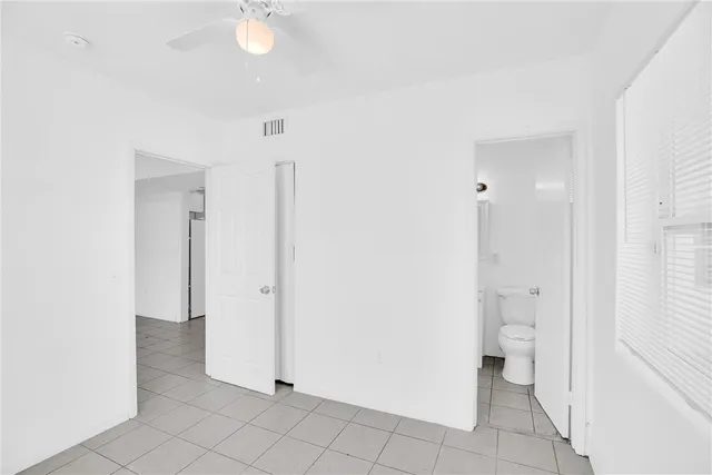 a view of a bathroom with a toilet