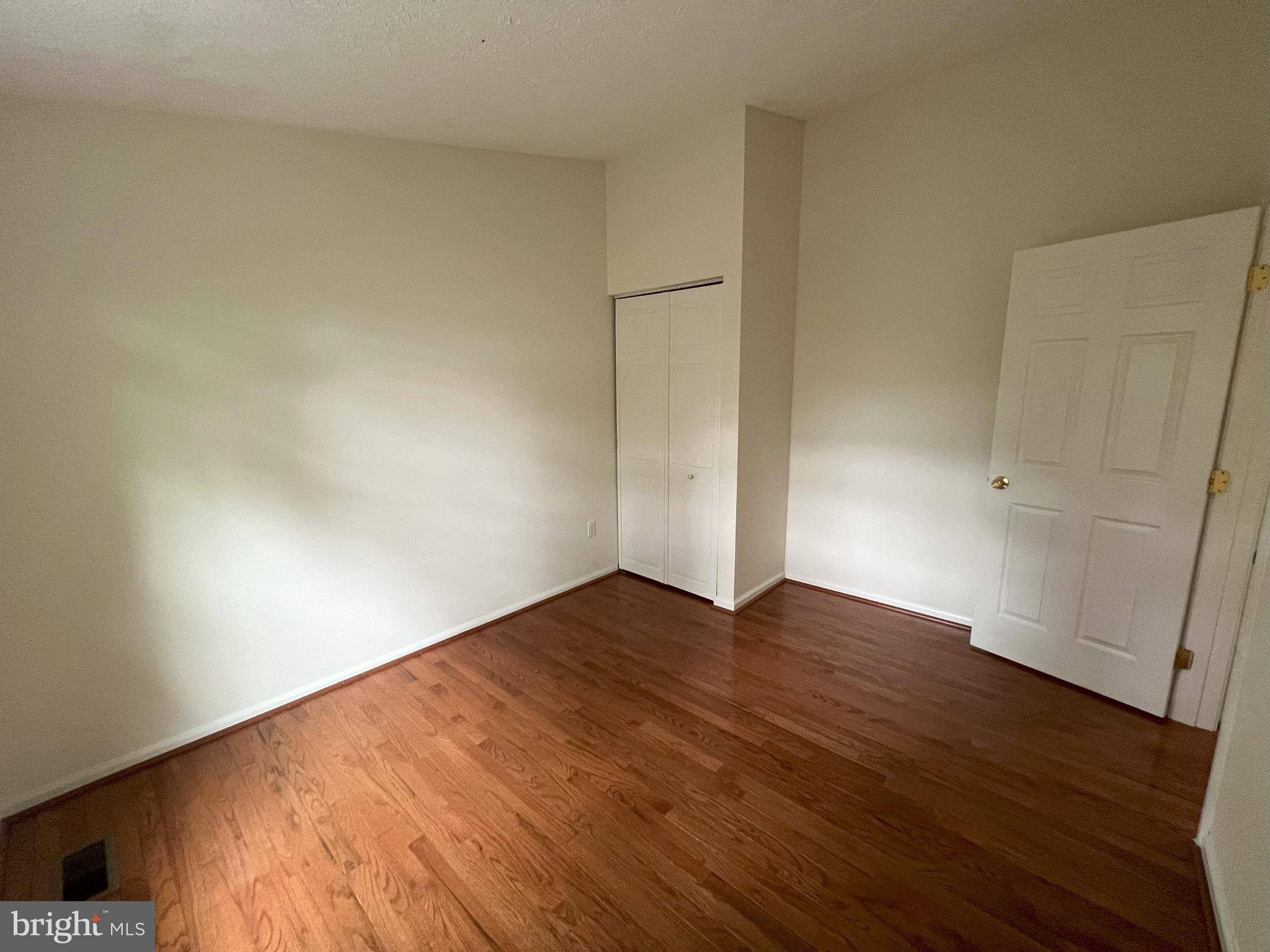 14027 Great Notch Terrace North Potomac, MD 20878 - Photo 13 of 27 a view of empty room with wooden floor