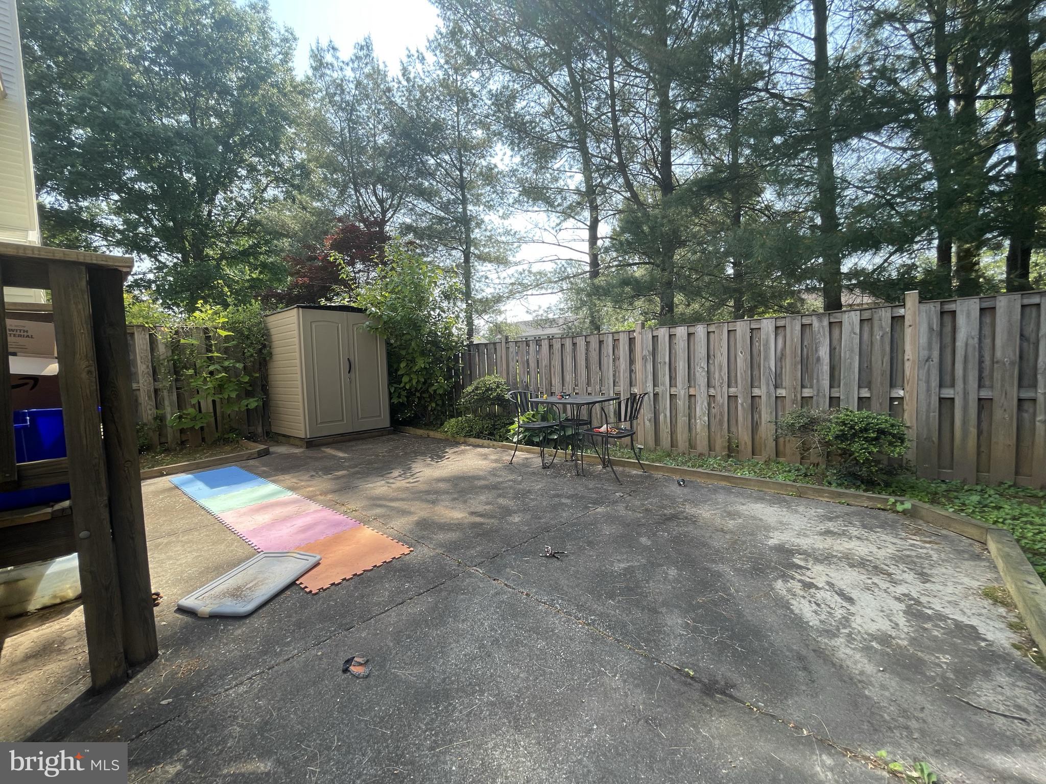 14027 Great Notch Terrace North Potomac, MD 20878 - Photo 25 of 27 a view of backyard with tub and trees