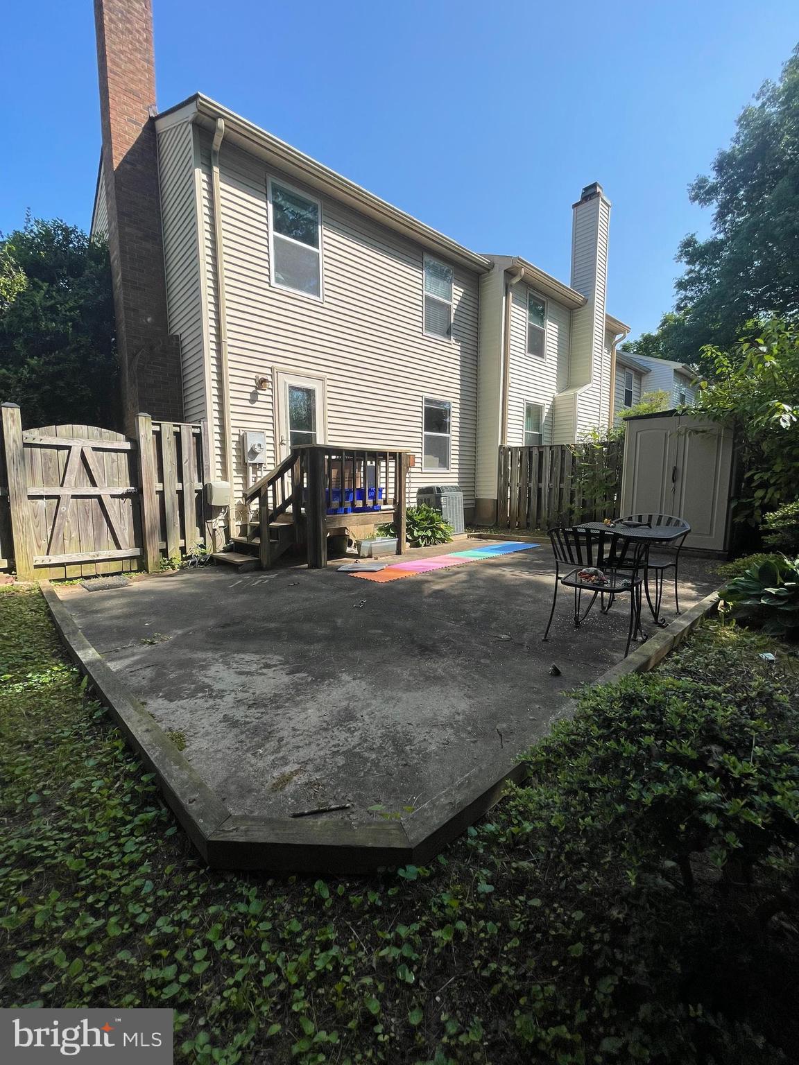 14027 Great Notch Terrace North Potomac, MD 20878 - Photo 26 of 27 a view of a house with backyard