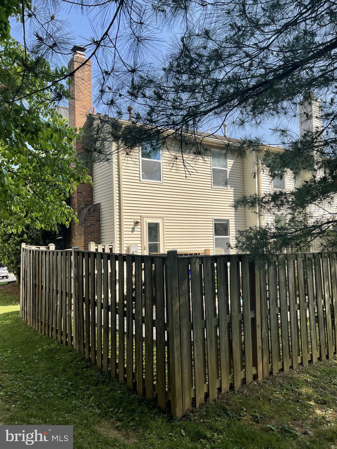 14027 Great Notch Terrace North Potomac, MD 20878 - Photo 27 of 27 a front view of a house with a garden