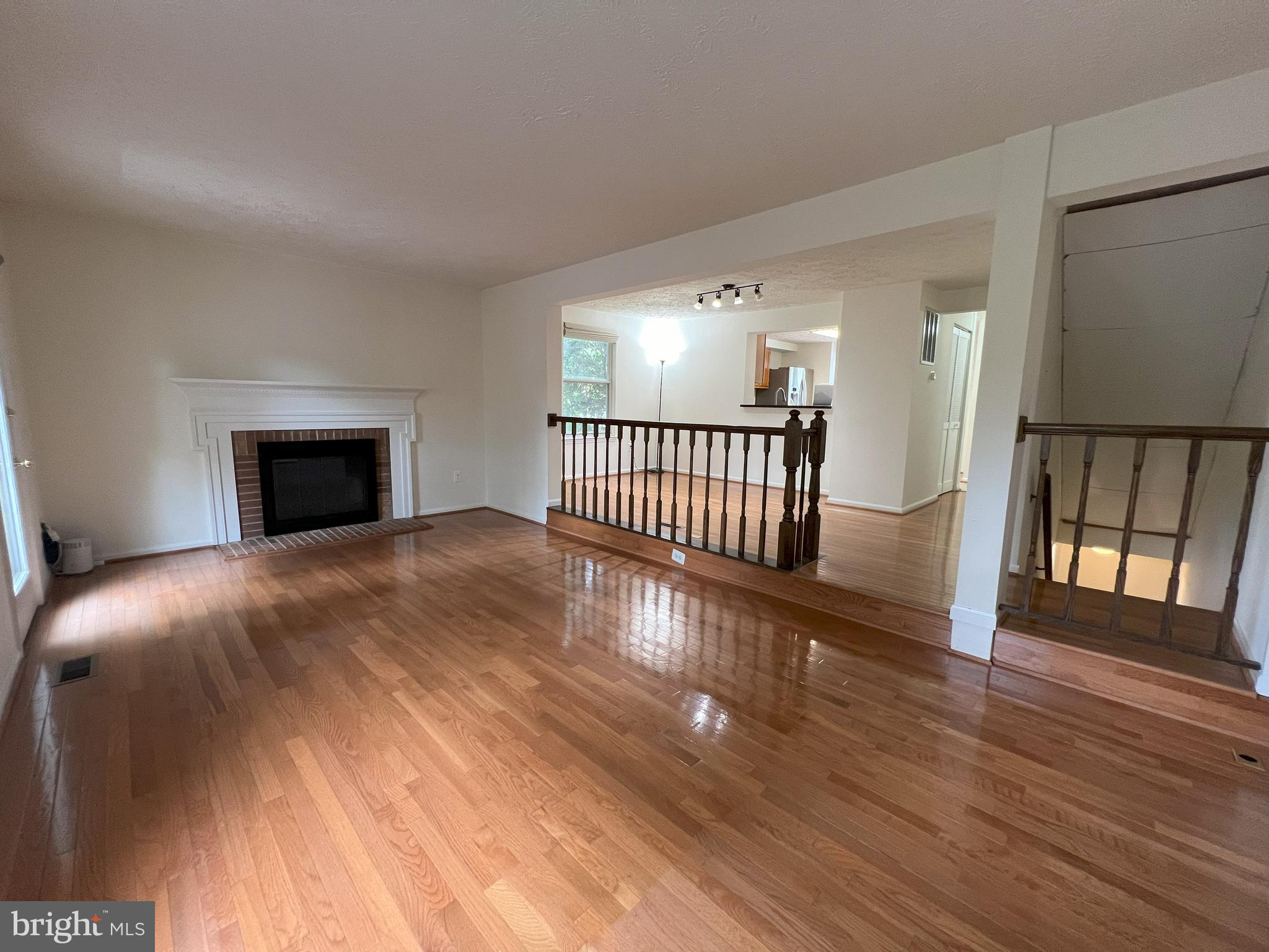 14027 Great Notch Terrace North Potomac, MD 20878 - Photo 9 of 27 a view of livingroom with furniture and wooden floor