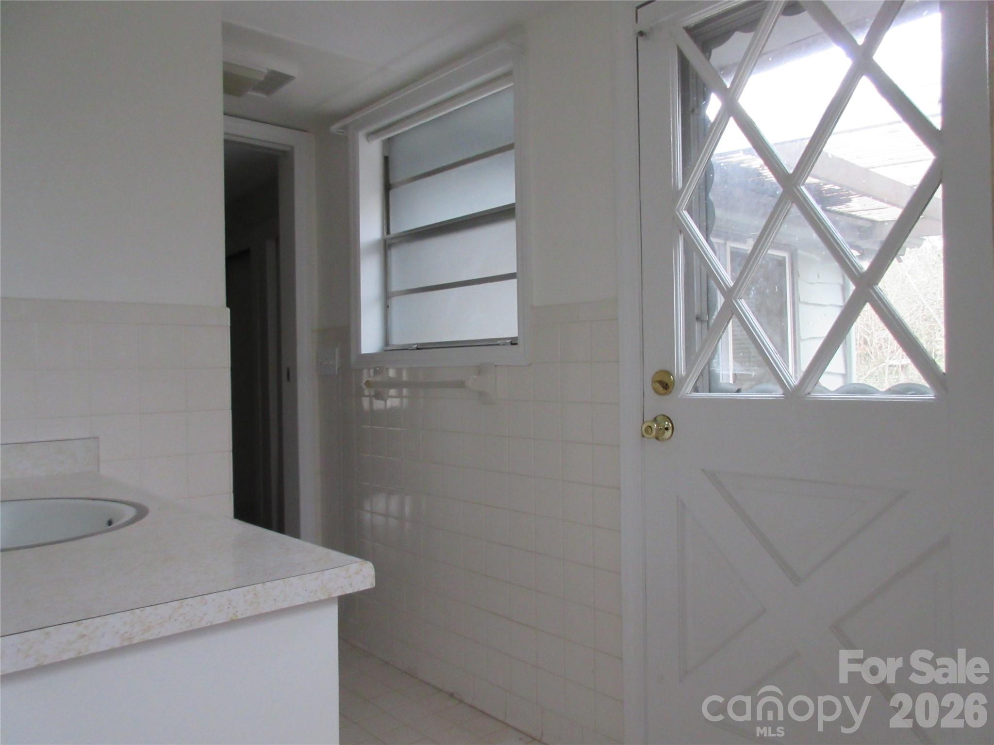 31 Ford Ridge Lane Columbus, NC 28722 - Photo 13 of 21 a utility room with a window