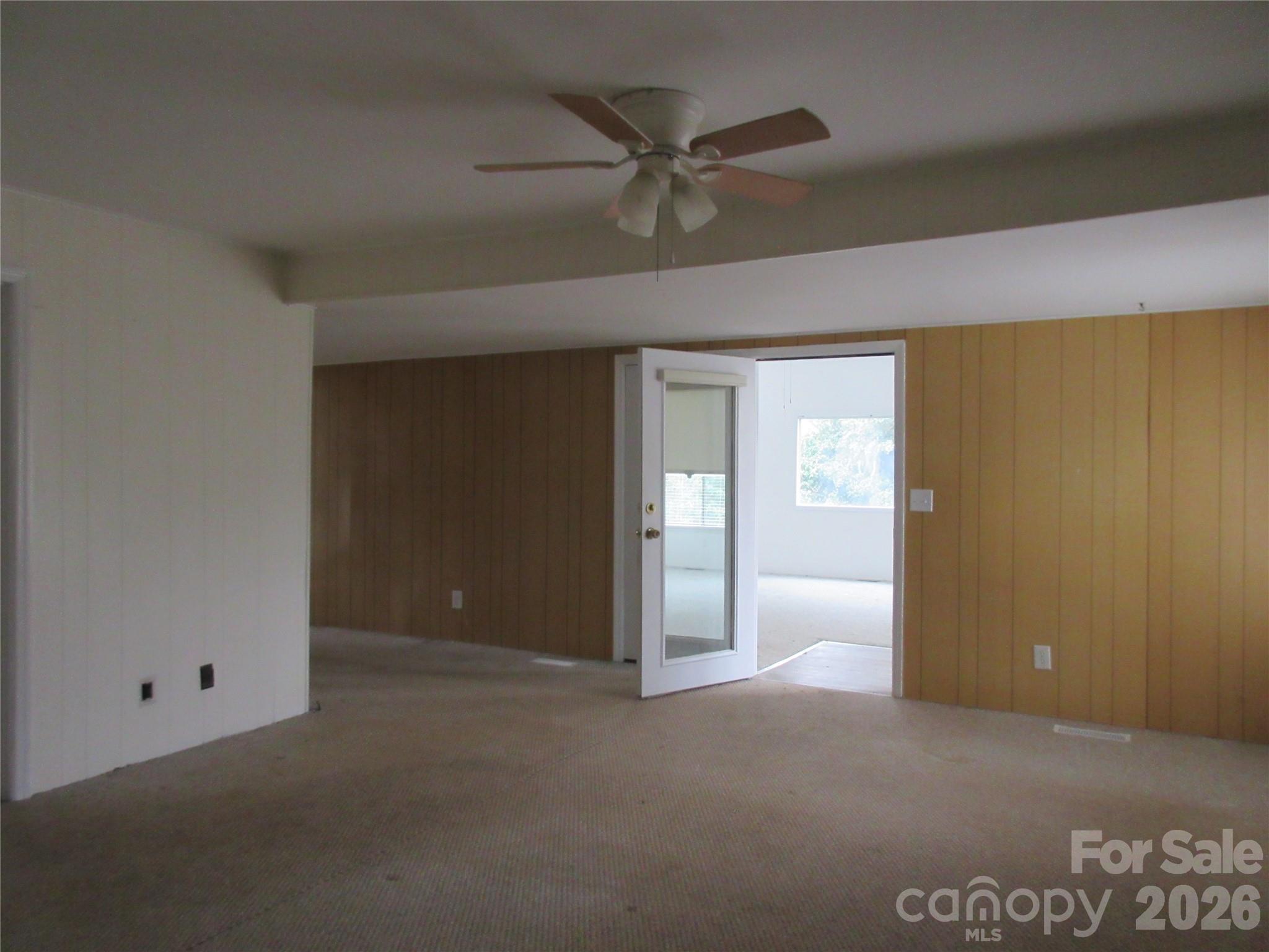 31 Ford Ridge Lane Columbus, NC 28722 - Photo 21 of 21 a view of an empty room with a ceiling fan