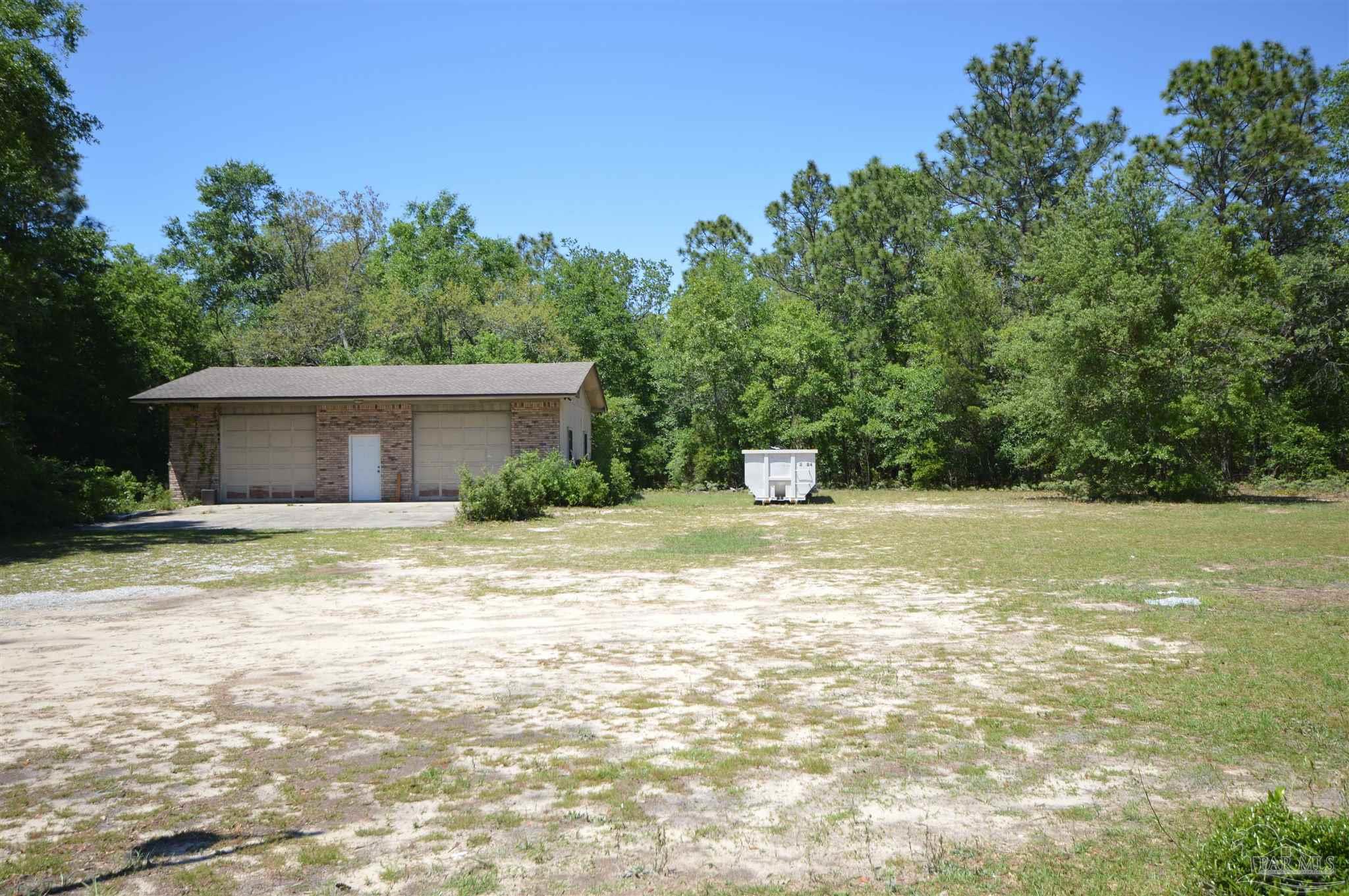 6004 Willard Norris Road Milton, FL 32570 - Photo 5 of 41 2 car garage w/ storage areas