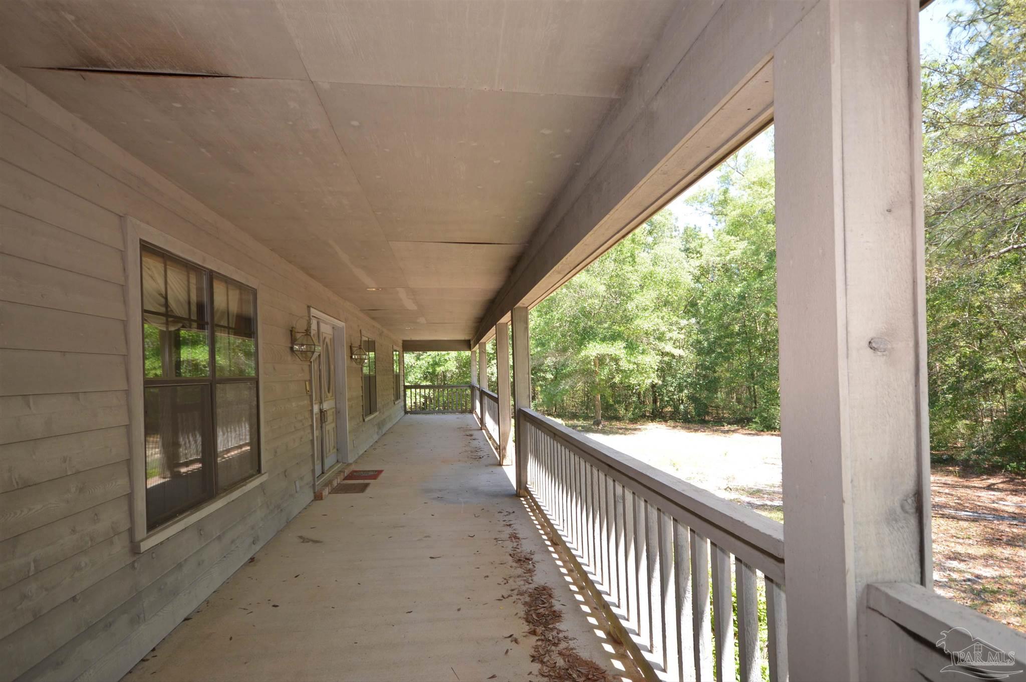 6004 Willard Norris Road Milton, FL 32570 - Photo 7 of 41 true southern style covered front porch