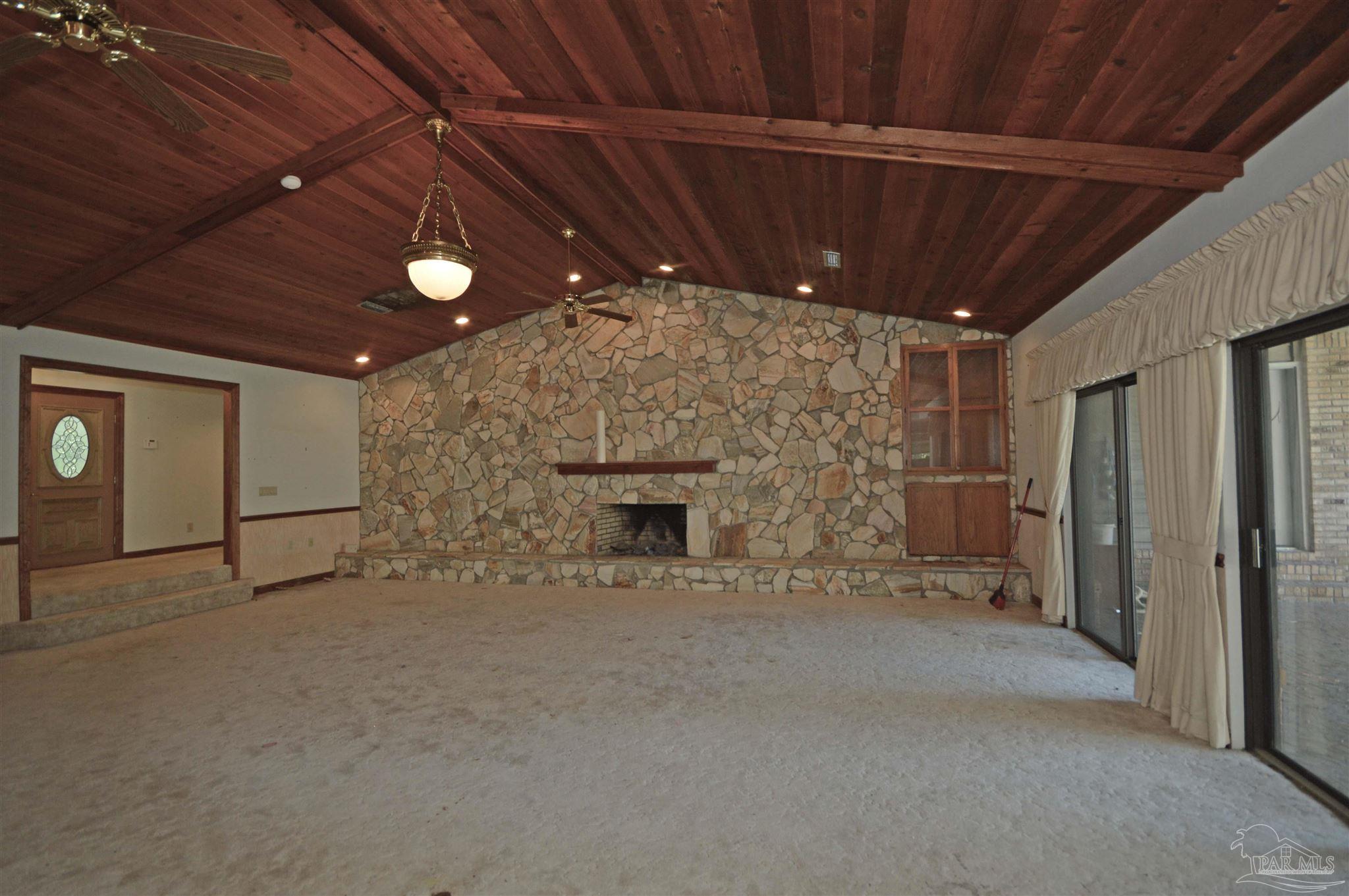 6004 Willard Norris Road Milton, FL 32570 - Photo 9 of 41 spacious, sunken family room w/ fireplace wall