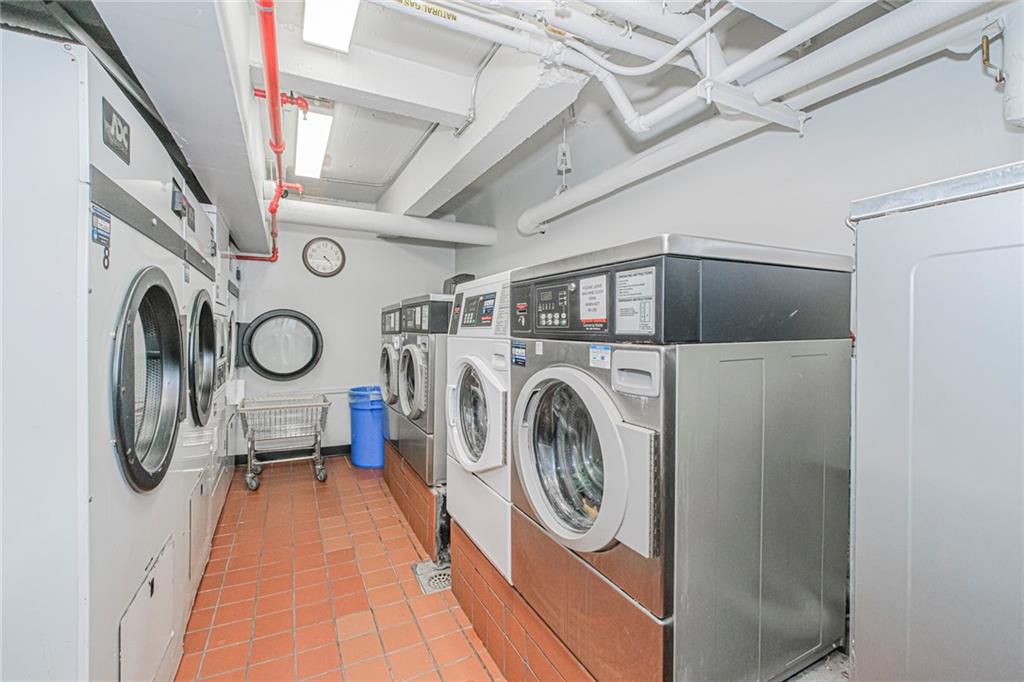 2140 Knapp Street, Unit 5H Brooklyn, NY 11229 - Photo 19 of 21 a utility room with dryer and washer