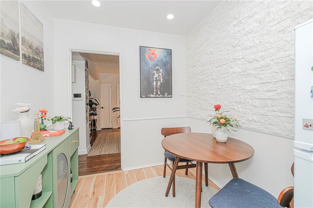 2140 Knapp Street, Unit 5H Brooklyn, NY 11229 - Photo 10 of 21 a room with a table and chairs