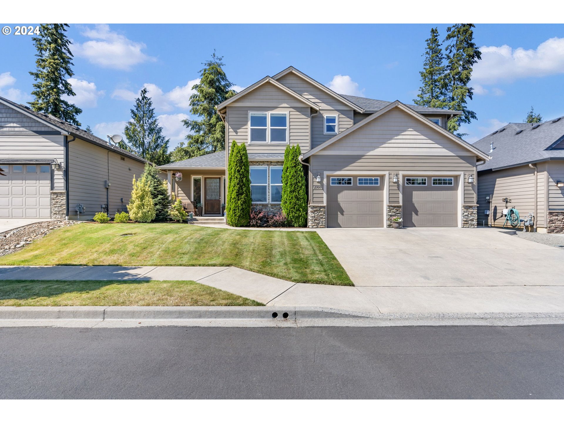 2306 North 4th Way Ridgefield, WA 98642 - Photo 1 of 1 a view of front of house with yard