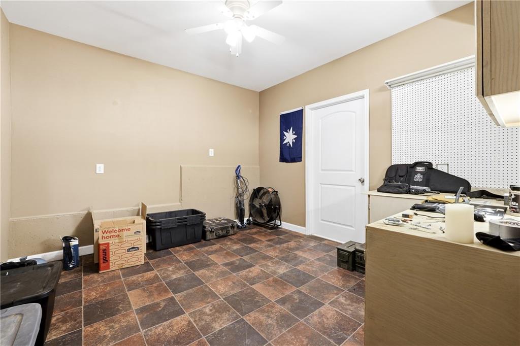 105 Widgeon Court Canton, GA 30115 - Photo 34 of 48 a kitchen with stainless steel appliances granite countertop a stove a sink and a refrigerator