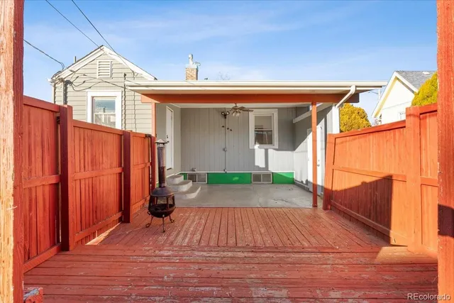 a view of outdoor space with deck and furniture