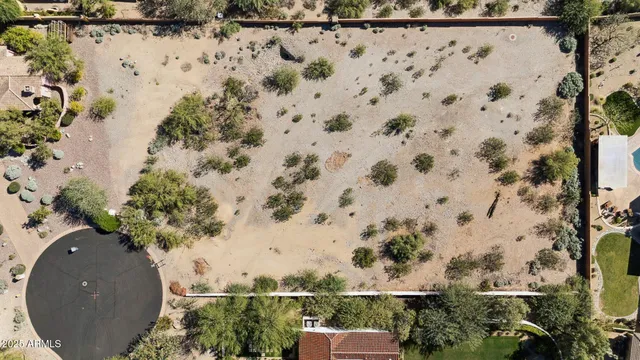 a view of a swimming pool and mountain view