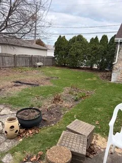 a house view with a backyard space