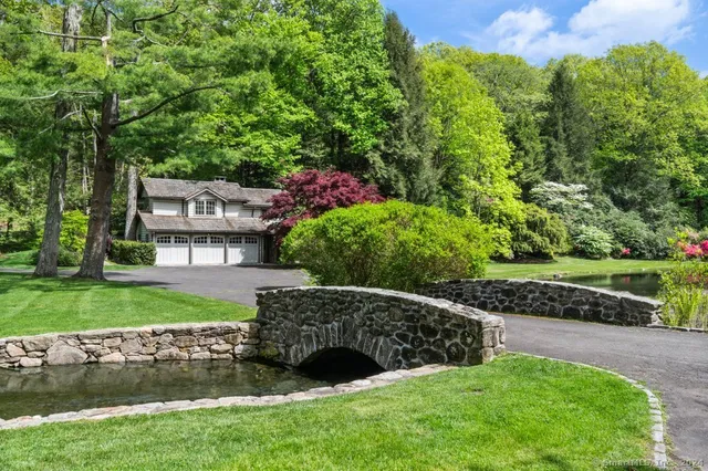 a view of a house with a garden