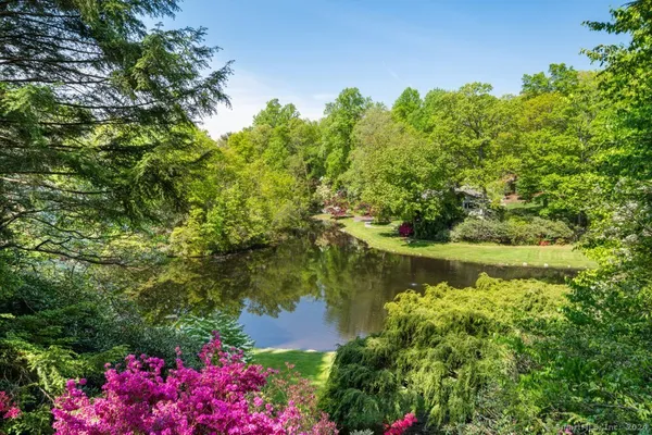 a view of a lake with a house