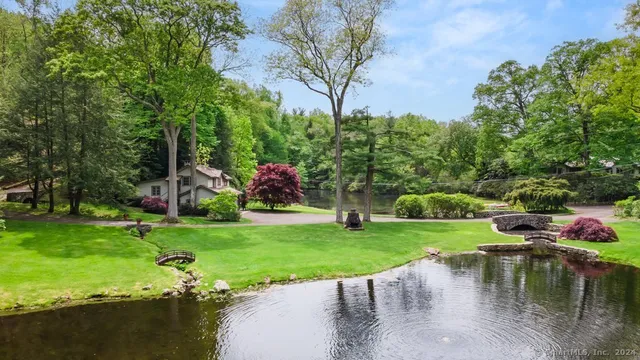 a view of a lake with a building in the background