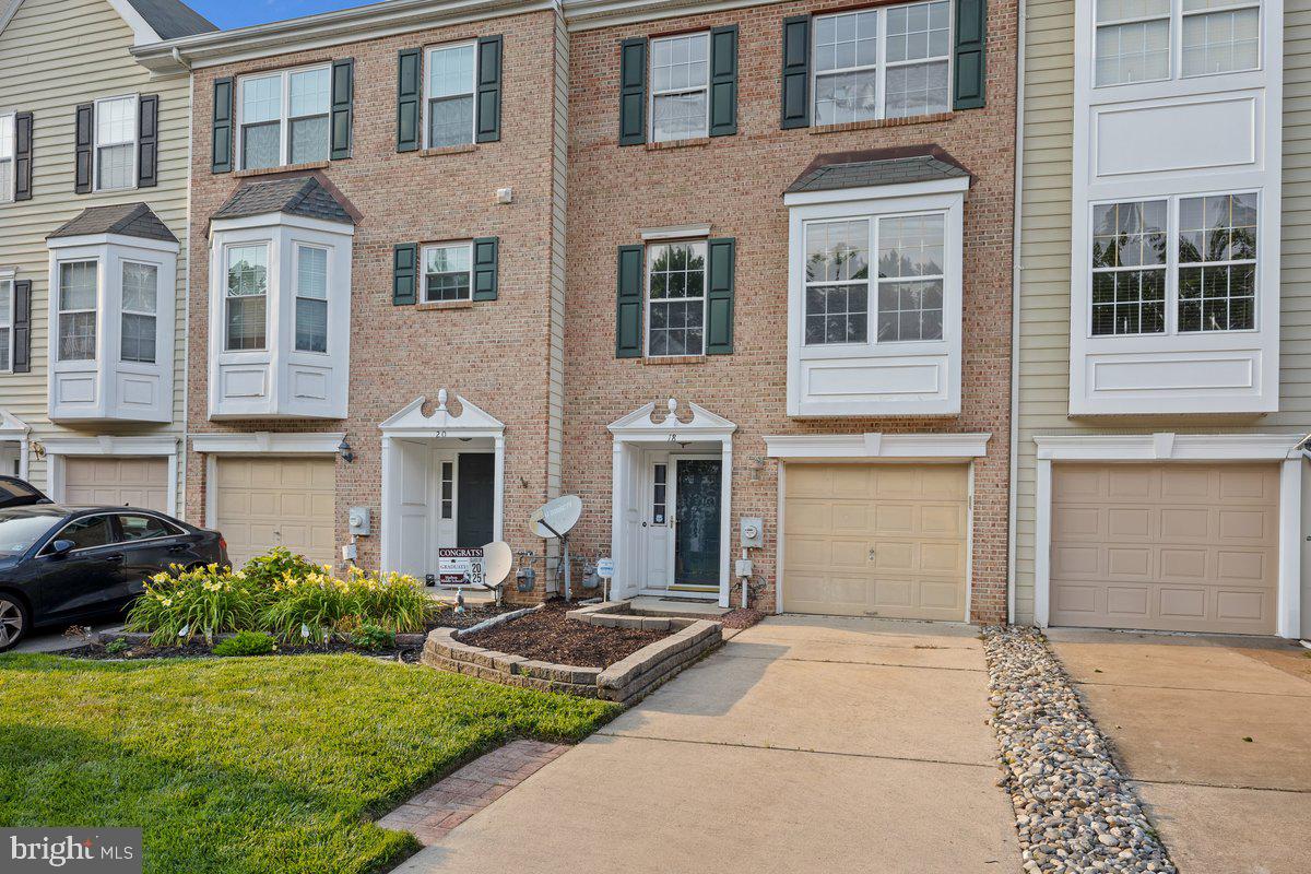 18 Alexandra Court Marlton, NJ 08053 - Photo 1 of 24 a front view of multiple houses with yard