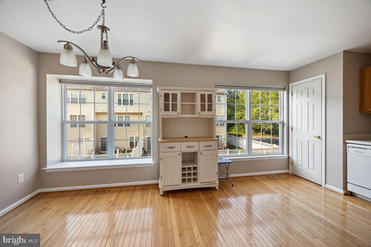 18 Alexandra Court Marlton, NJ 08053 - Photo 11 of 24 a view of a room with wooden floor and a window