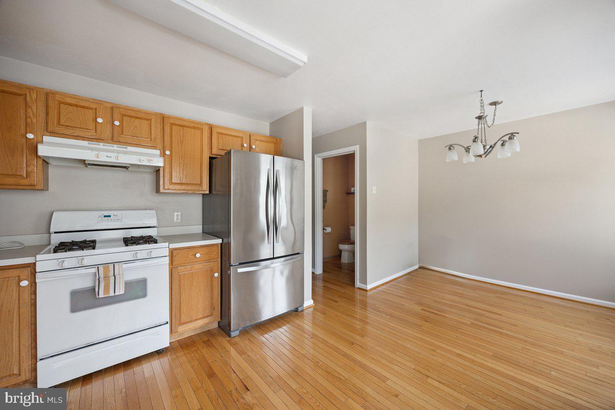 18 Alexandra Court Marlton, NJ 08053 - Photo 13 of 24 a kitchen with a refrigerator sink and cabinets