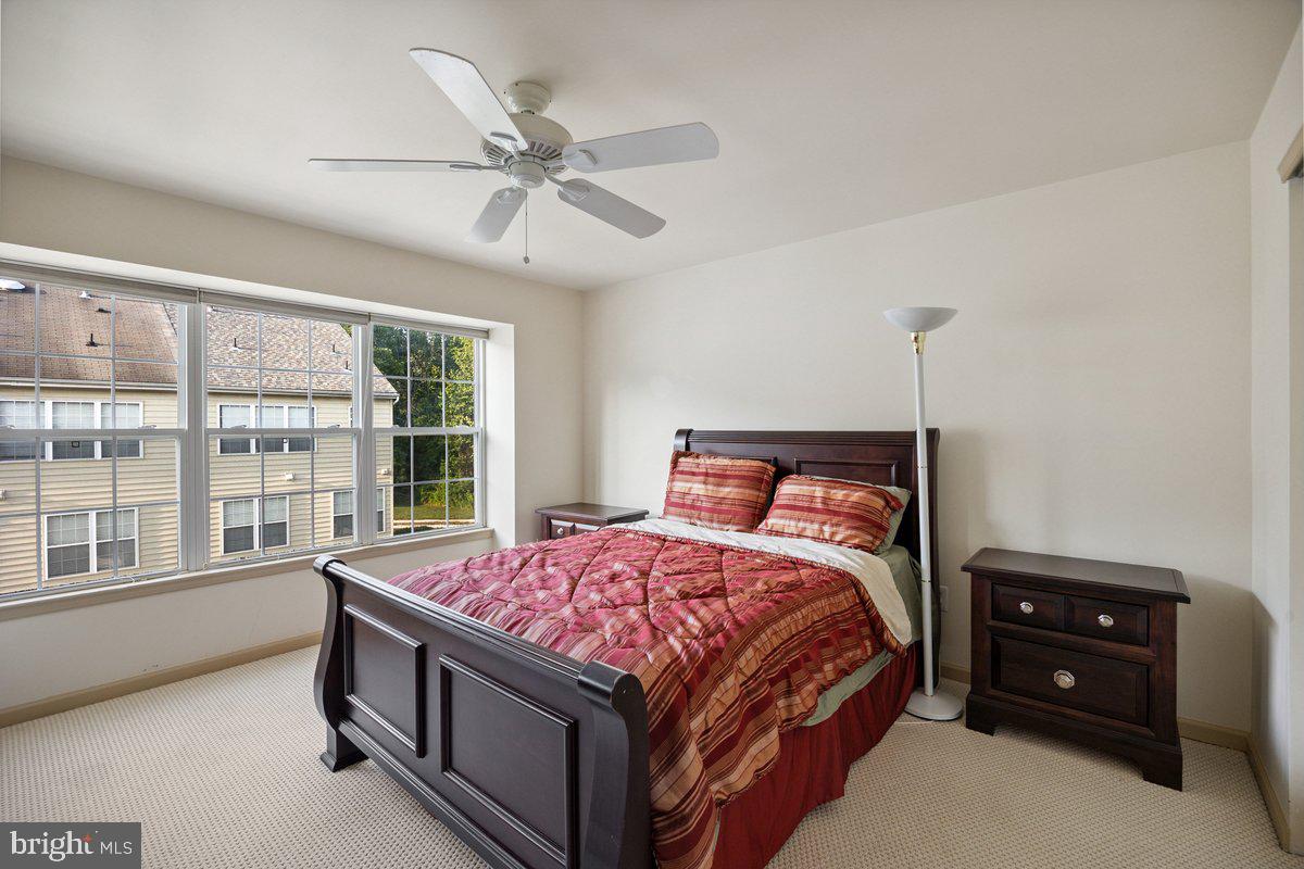 18 Alexandra Court Marlton, NJ 08053 - Photo 15 of 24 a bedroom with a bed and a large window