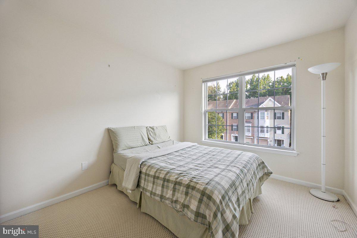 18 Alexandra Court Marlton, NJ 08053 - Photo 20 of 24 a bedroom with a bed and a window