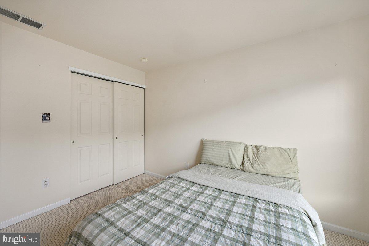 18 Alexandra Court Marlton, NJ 08053 - Photo 21 of 24 a bedroom with a bed and a window