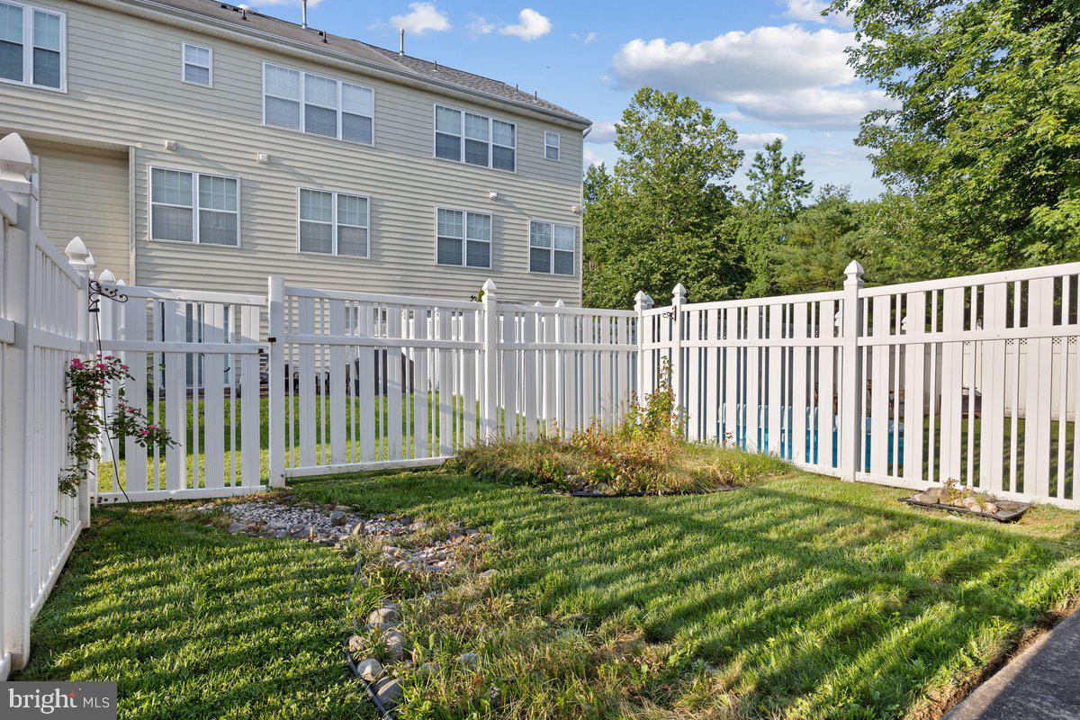 18 Alexandra Court Marlton, NJ 08053 - Photo 24 of 24 a view of a garden with a flower plants