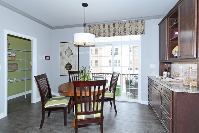 21 Marcel Lane Schaumburg, IL 60194 - Photo 12 of 22 a view of a dining room with furniture window and wooden floor