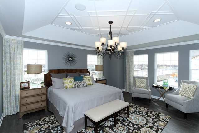 21 Marcel Lane Schaumburg, IL 60194 - Photo 16 of 22 a bedroom with a bed and a chandelier