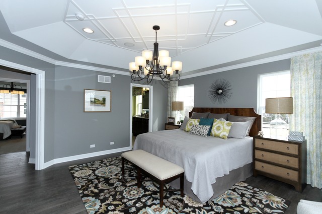21 Marcel Lane Schaumburg, IL 60194 - Photo 17 of 22 a bedroom with a bed and a chandelier