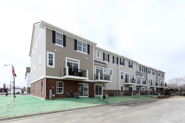 21 Marcel Lane Schaumburg, IL 60194 - Photo 22 of 22 a view of a building with a yard