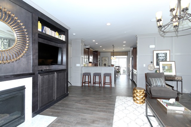 21 Marcel Lane Schaumburg, IL 60194 - Photo 6 of 22 a living room with fireplace furniture and a flat screen tv