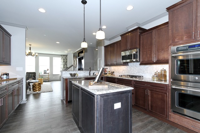 21 Marcel Lane Schaumburg, IL 60194 - Photo 9 of 22 a kitchen with stove a sink and refrigerator