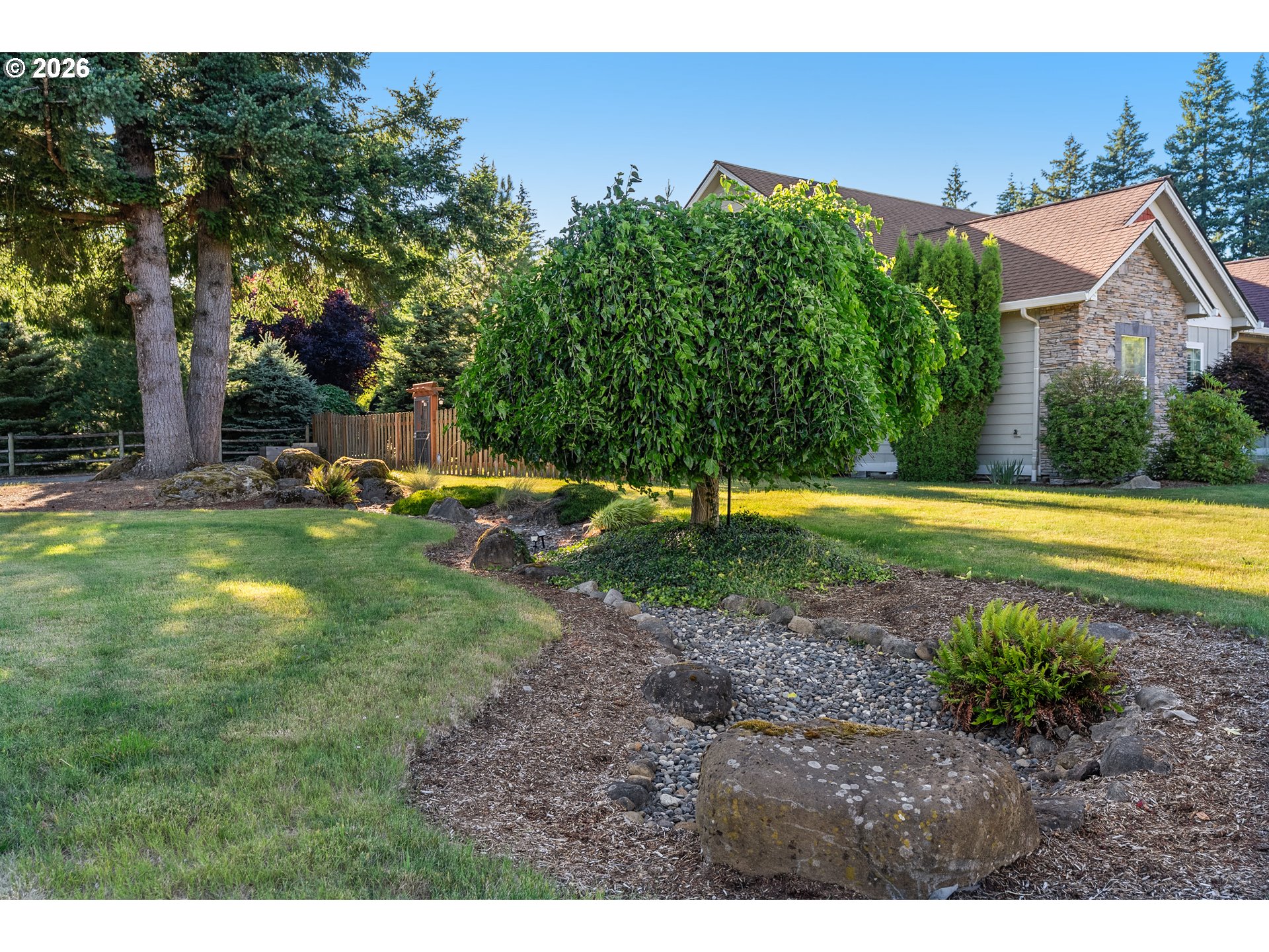 945 Northwest Angel Heights Road Stevenson, WA 98648 - Photo 34 of 41 a view of a house with a yard