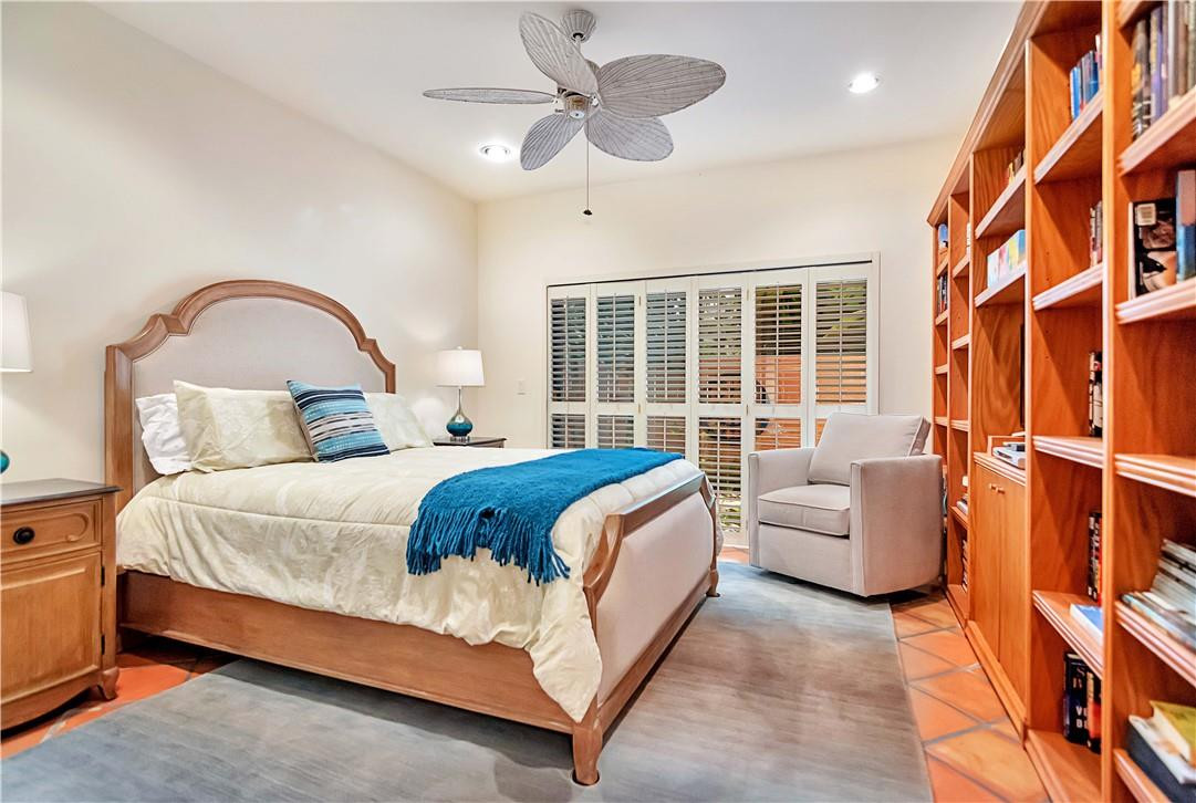 6396 Via Rosa Boca Raton, FL 33433 - Photo 21 of 30 a bedroom with bed couch and window
