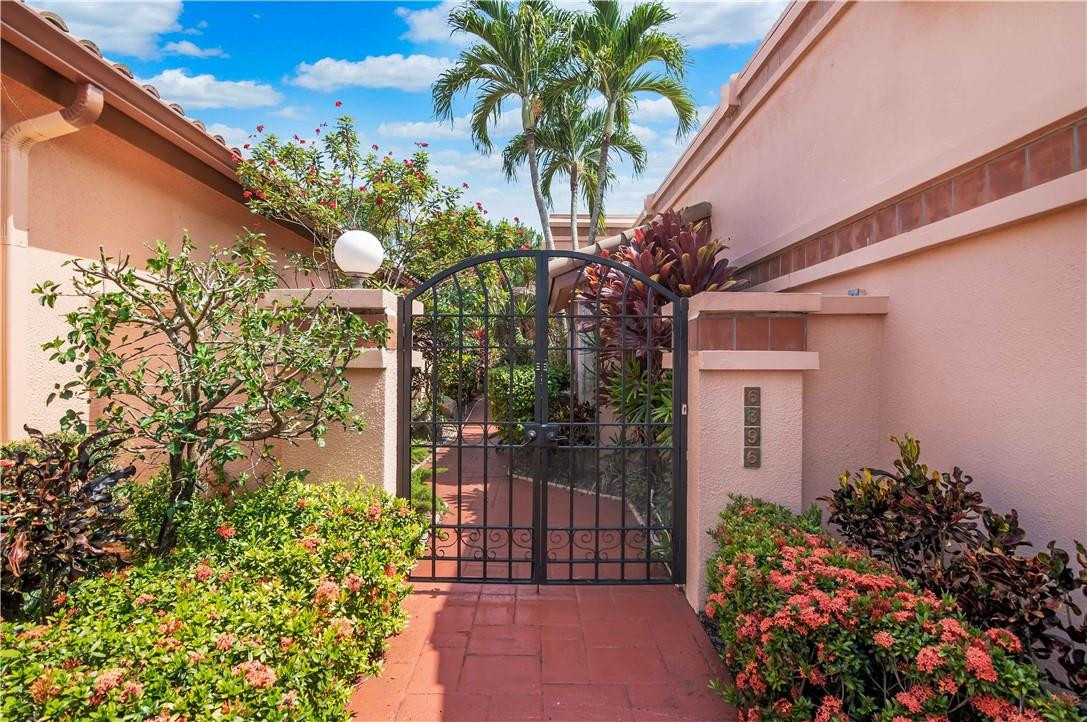 6396 Via Rosa Boca Raton, FL 33433 - Photo 3 of 30 a flower plants in front of a house