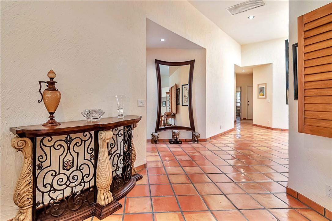 6396 Via Rosa Boca Raton, FL 33433 - Photo 6 of 30 a view of a hallway and wooden floor
