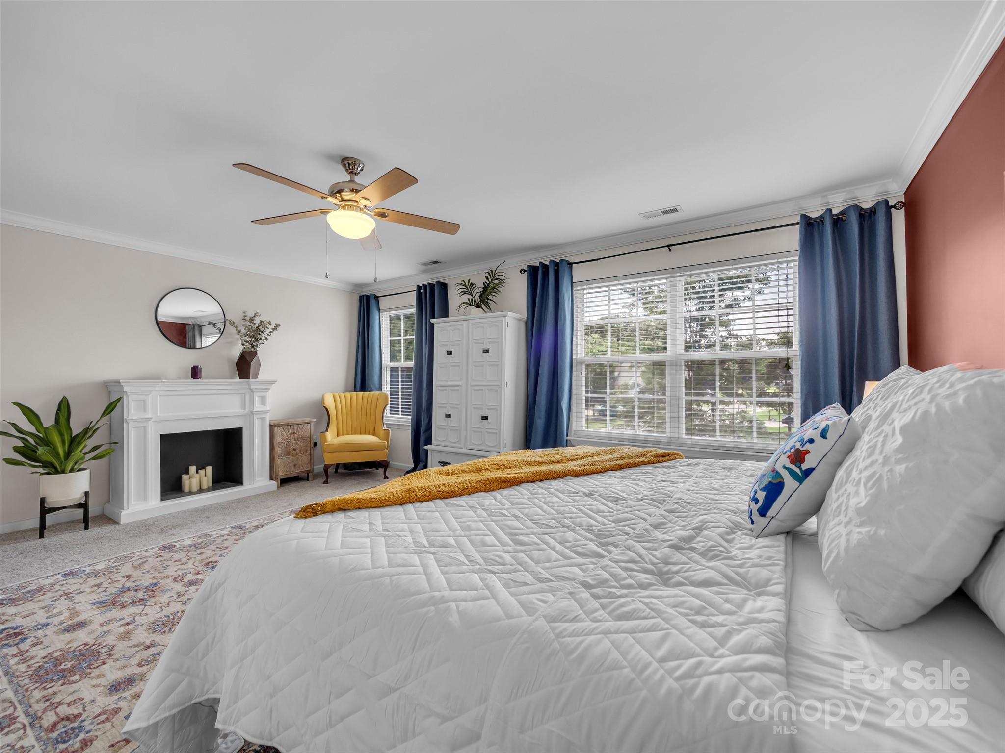 4113 Edgeview Drive Indian Trail, NC 28079 - Photo 16 of 28 a bedroom with a bed and a fireplace