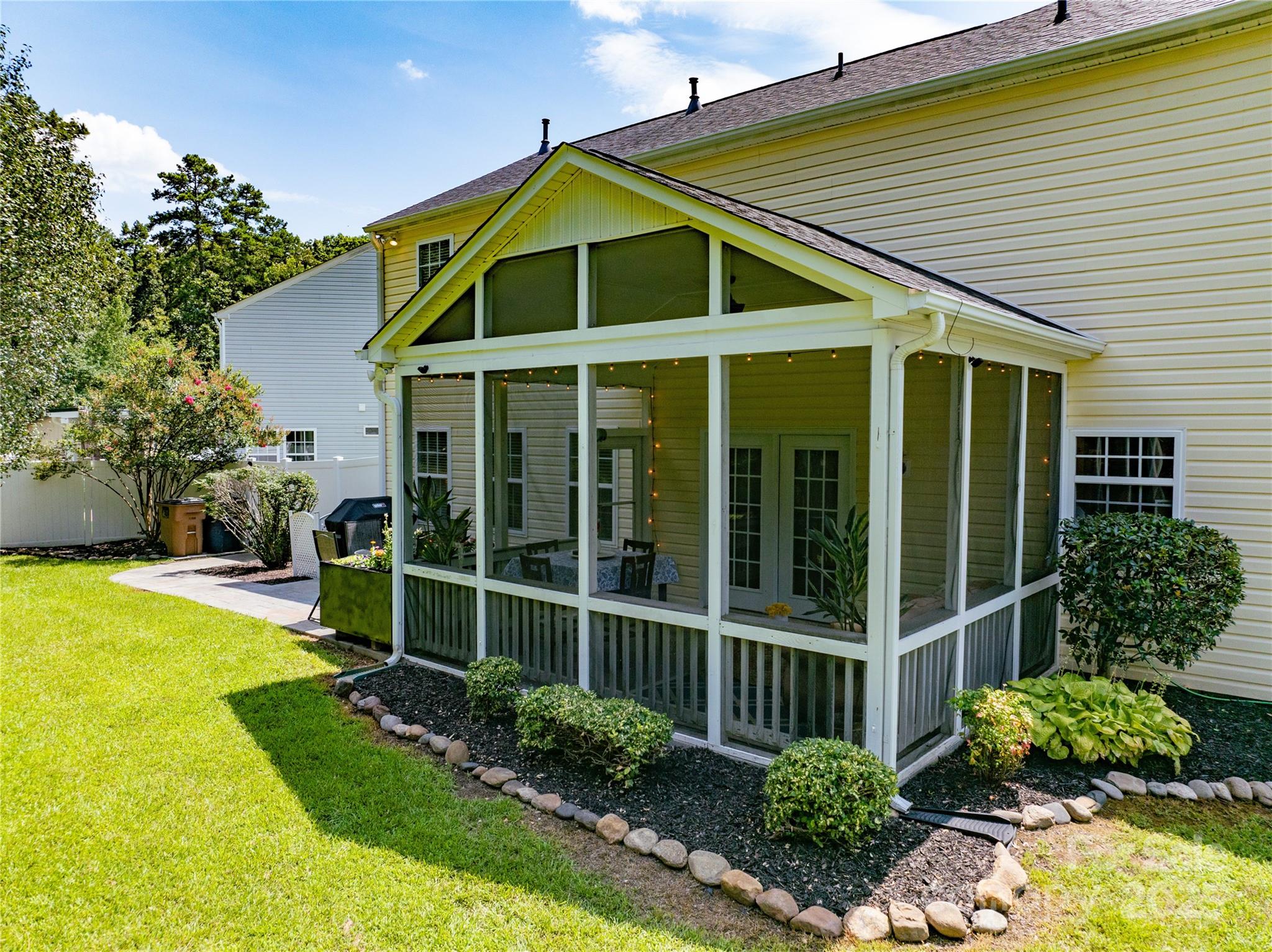 4113 Edgeview Drive Indian Trail, NC 28079 - Photo 2 of 28 a view of an house with backyard space and garden