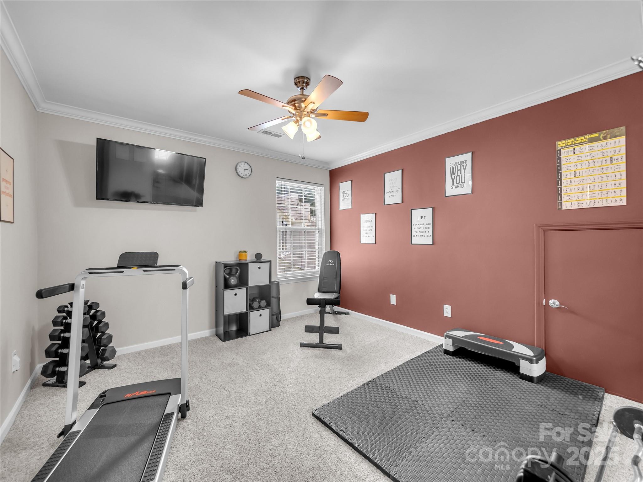 4113 Edgeview Drive Indian Trail, NC 28079 - Photo 22 of 28 a view of a livingroom with furniture and a flat screen tv