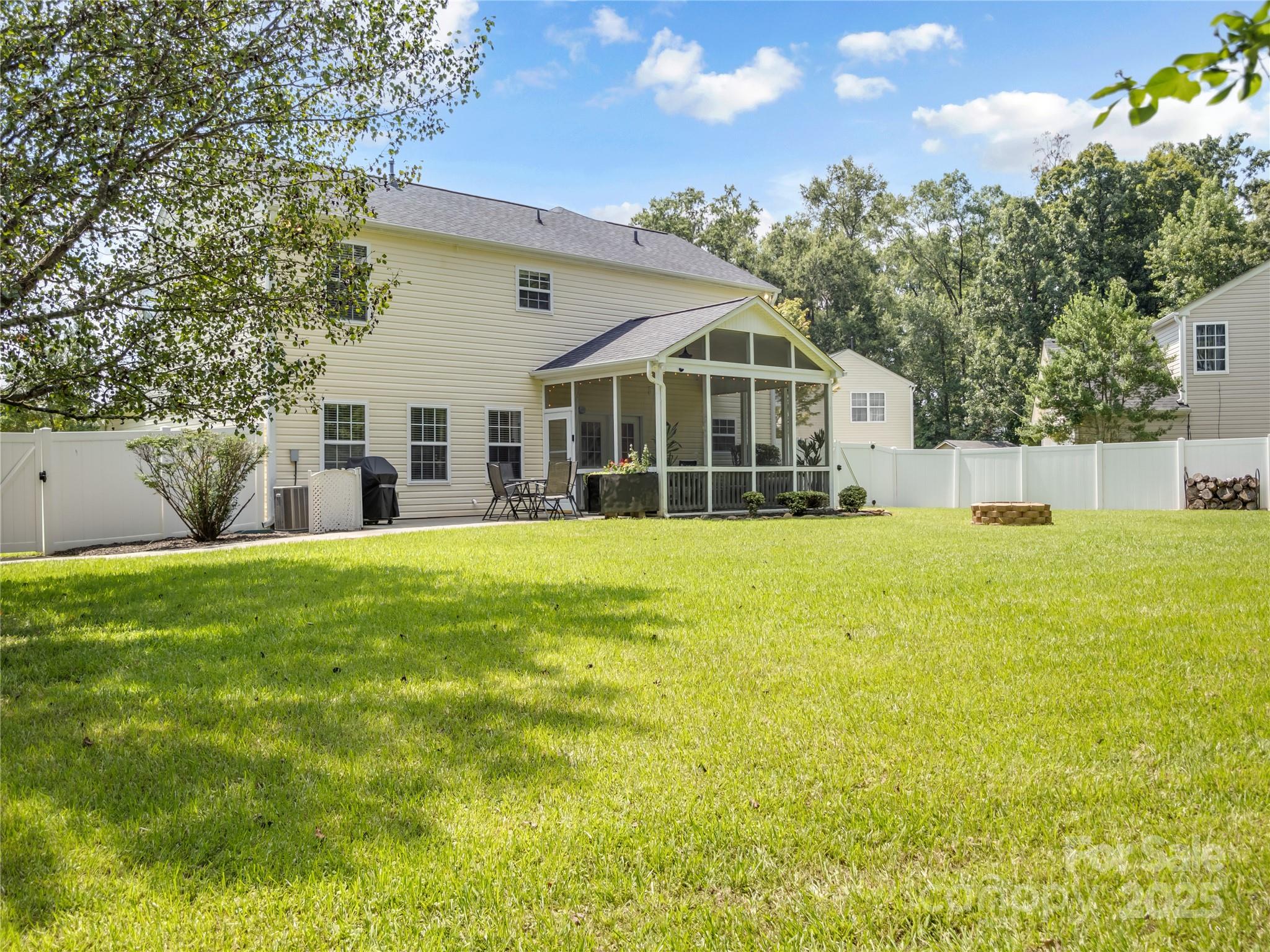 4113 Edgeview Drive Indian Trail, NC 28079 - Photo 25 of 28 a view of a house with a yard and sitting area