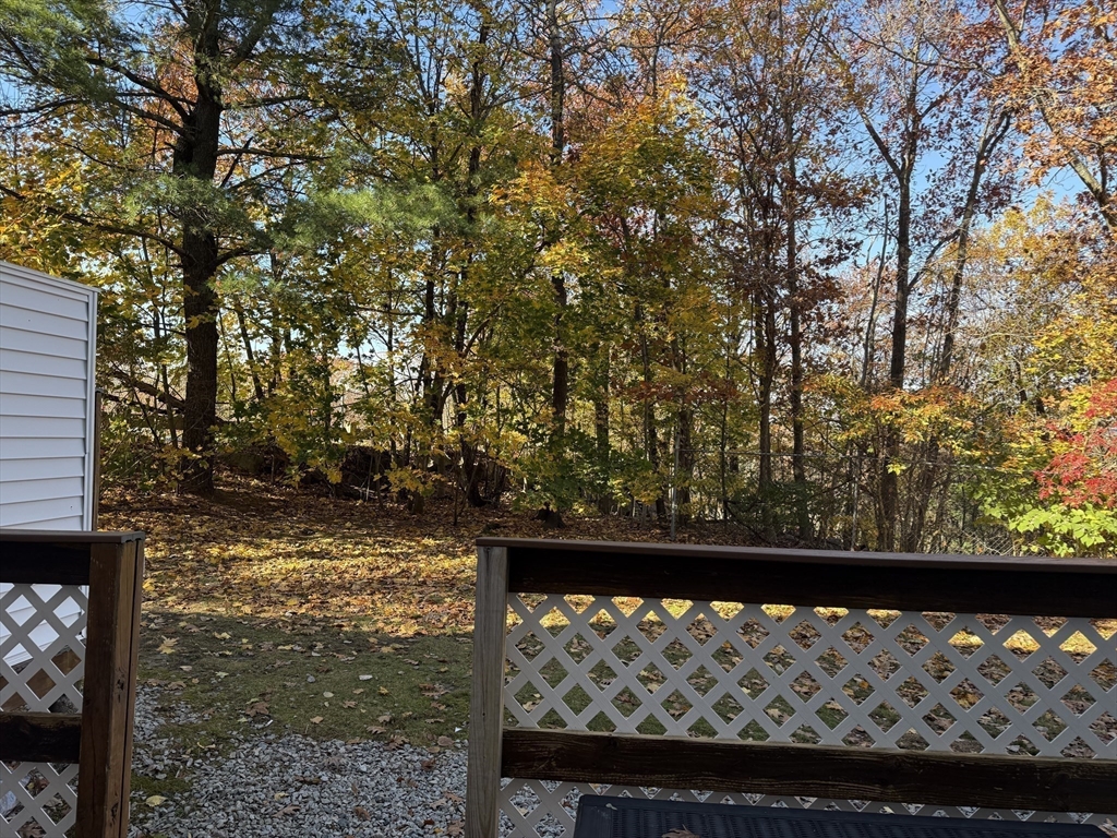 191 Tall Oaks Drive, Unit C Weymouth, MA 02190 - Photo 22 of 24 a view of a yard from a balcony